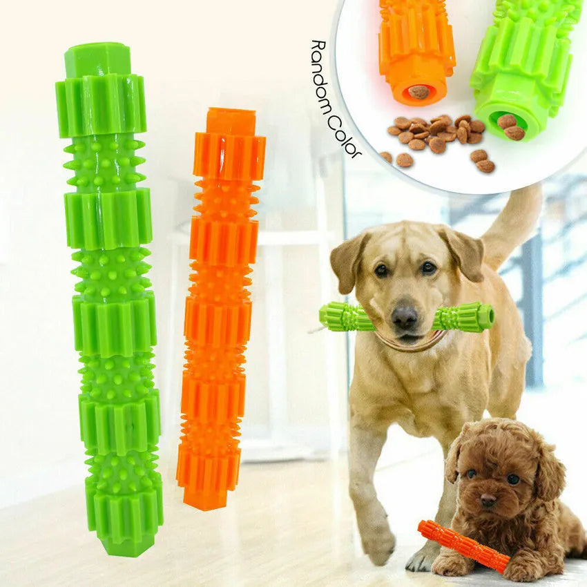 Green durable rubber dog chew toy with treat-dispensing hole and squeaker, for aggressive chewers.