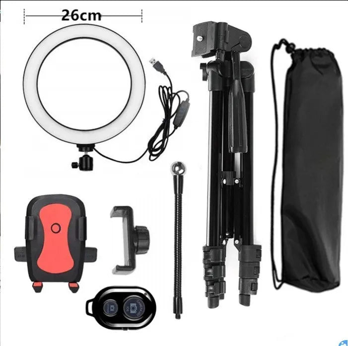 Adjustable aluminium live phone stand extended to various heights between 35 and 110 centimetres.