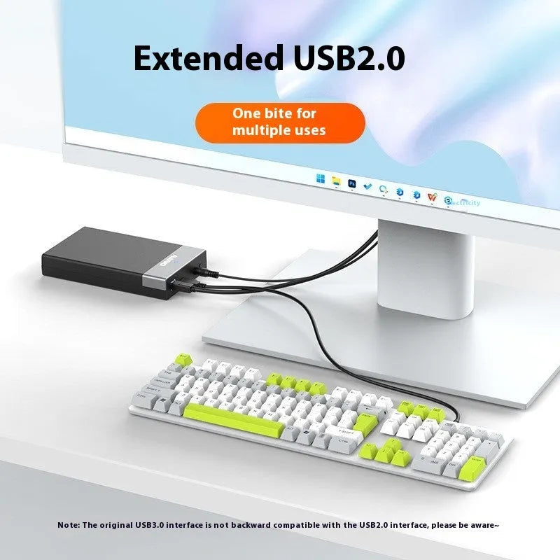 Black and silver 3.5-inch SATA to USB hard drive enclosure with power adapter and data cable