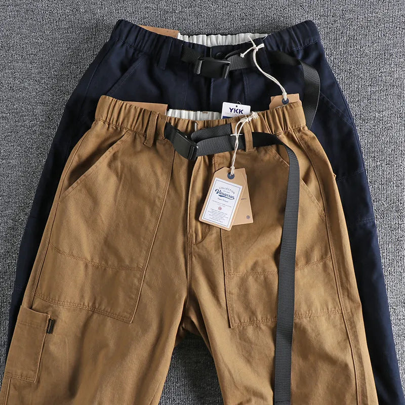Men's cotton workwear casual pants in khaki and dark blue with three-dimensional cutting and mid waist zipper fly design