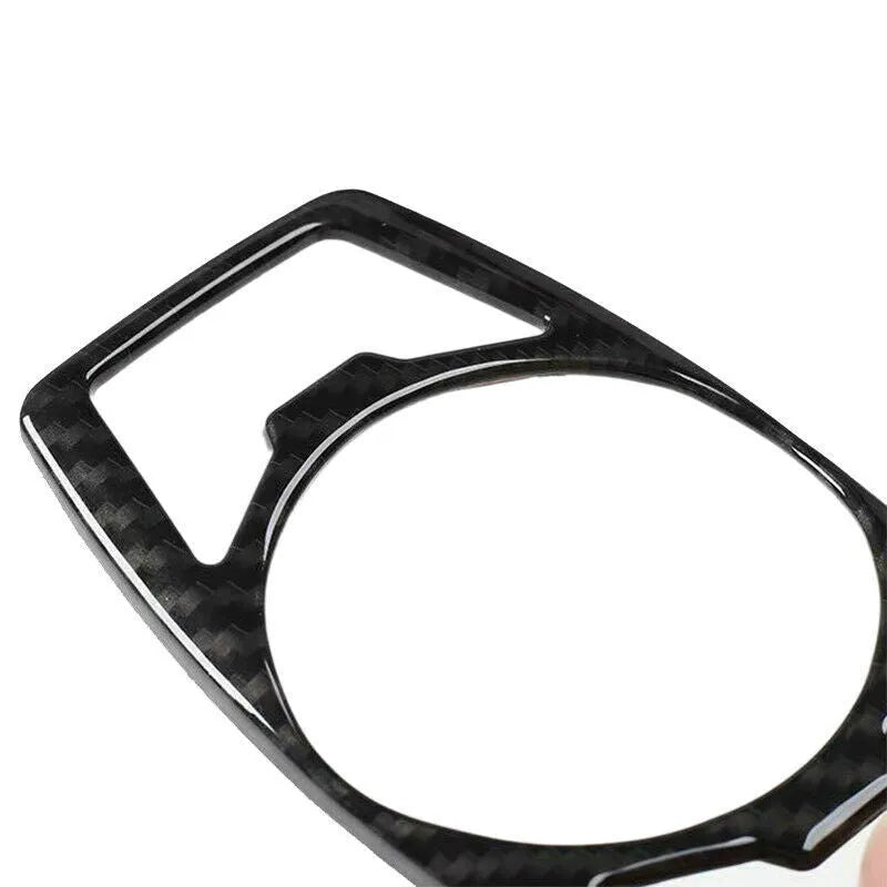Carbon fibre patterned decorative paster for Ford F150 headlight control panel.