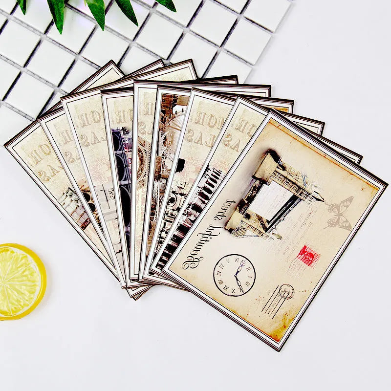 Set of nine retro cartoon style postcards with Paris tower and historic landmark illustrations