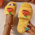 Halloween pumpkin cartoon plush slippers with synthetic fur upper and anti-slip PVC soles