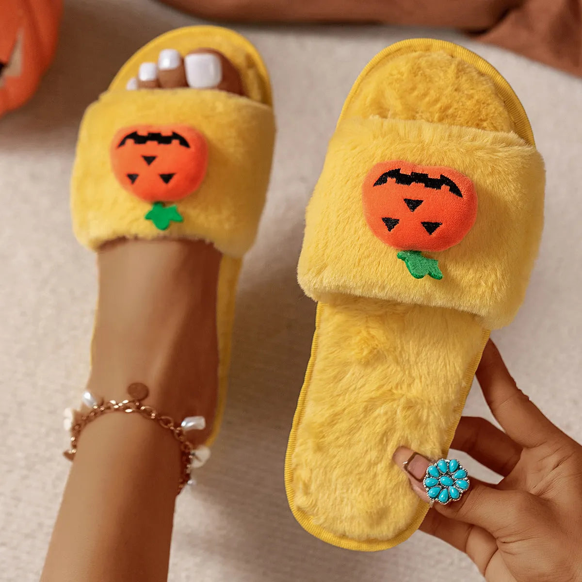 Halloween pumpkin cartoon plush slippers with synthetic fur upper and anti-slip PVC soles