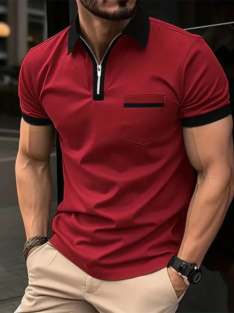 Man wearing a loose-fit casual short sleeve shirt with a chest pocket and zipper decoration.