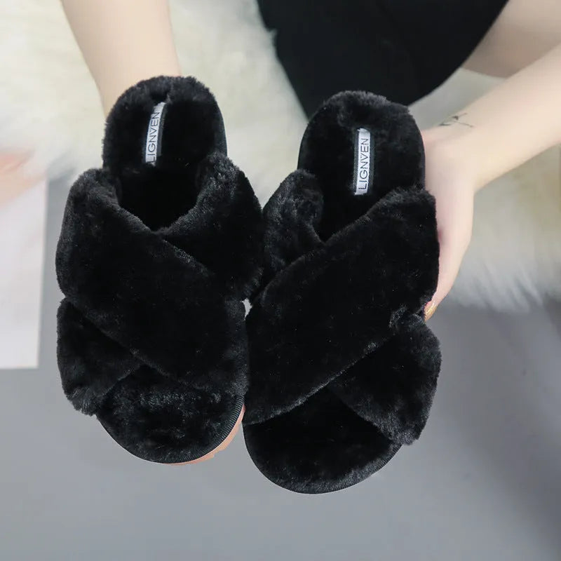 Cross open-toe fur slippers in various colours on a non-slip patterned rubber sole.