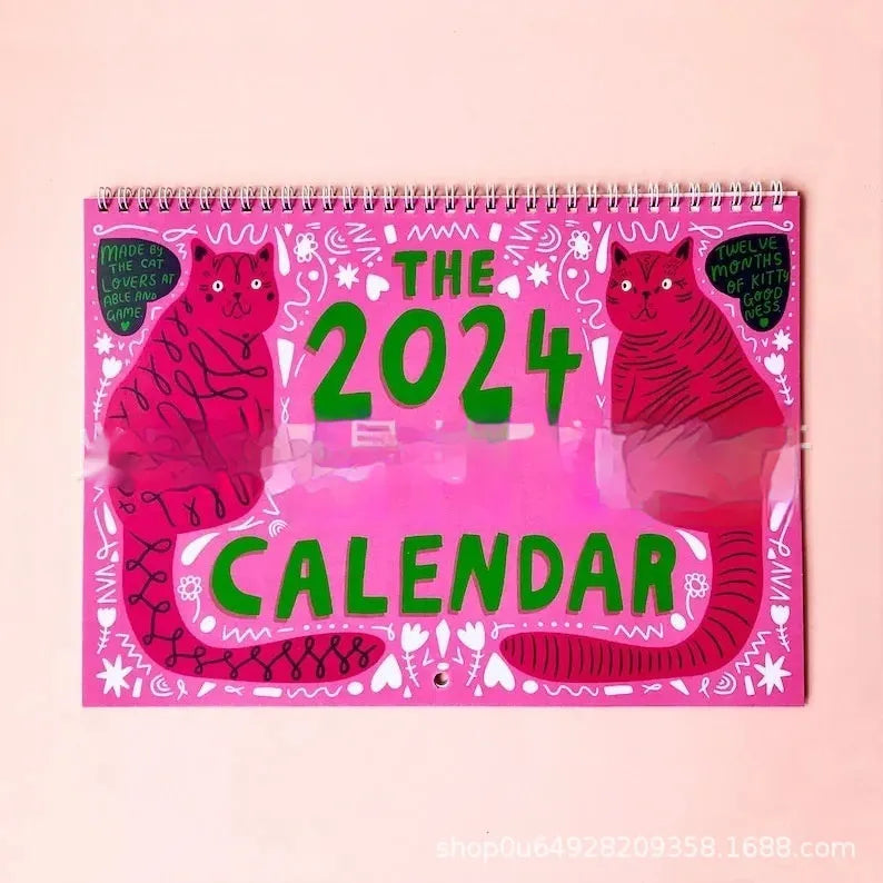 A portrait-format paper wall calendar featuring cat imagery, available for the 2024 or 2025 year.