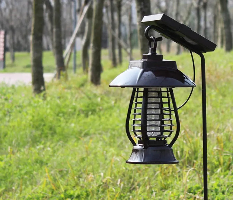 Black solar-powered mosquito lamp with solar panel and LED lights for outdoor insect control