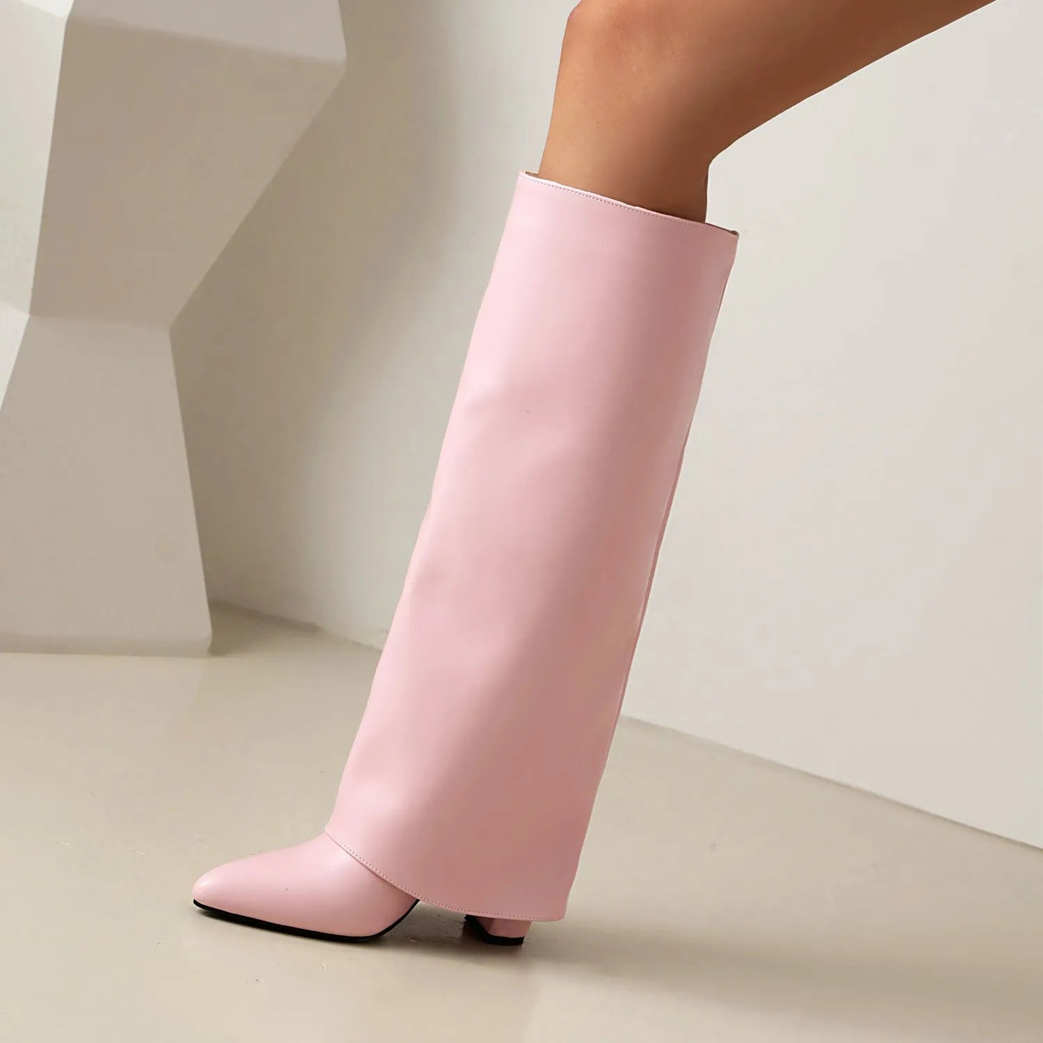 Women's black thick high heel boot with sewing line detail on artificial PU upper