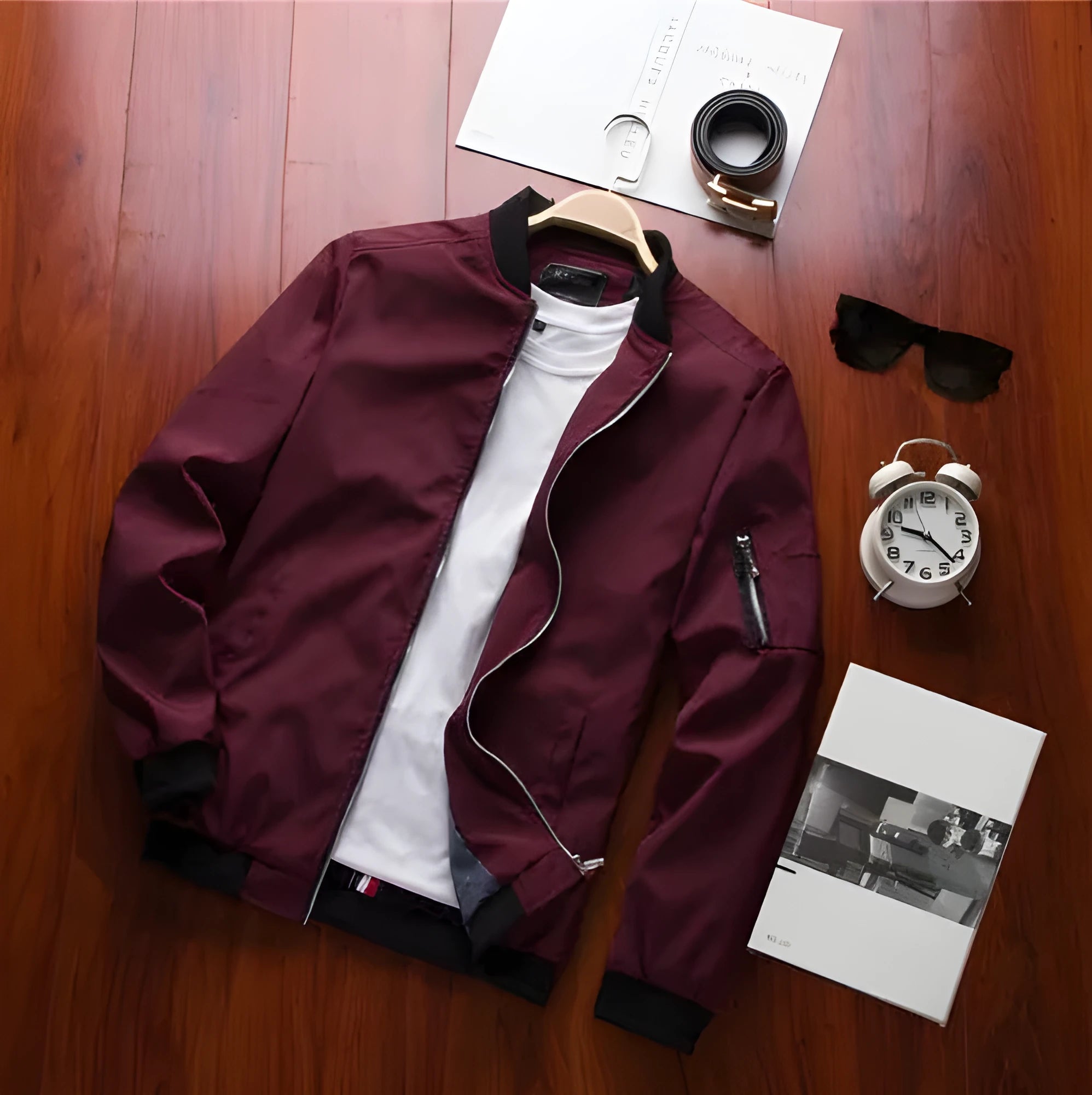 Men's slim fit casual jacket in a solid colour with a stand collar and side zippered pockets.
