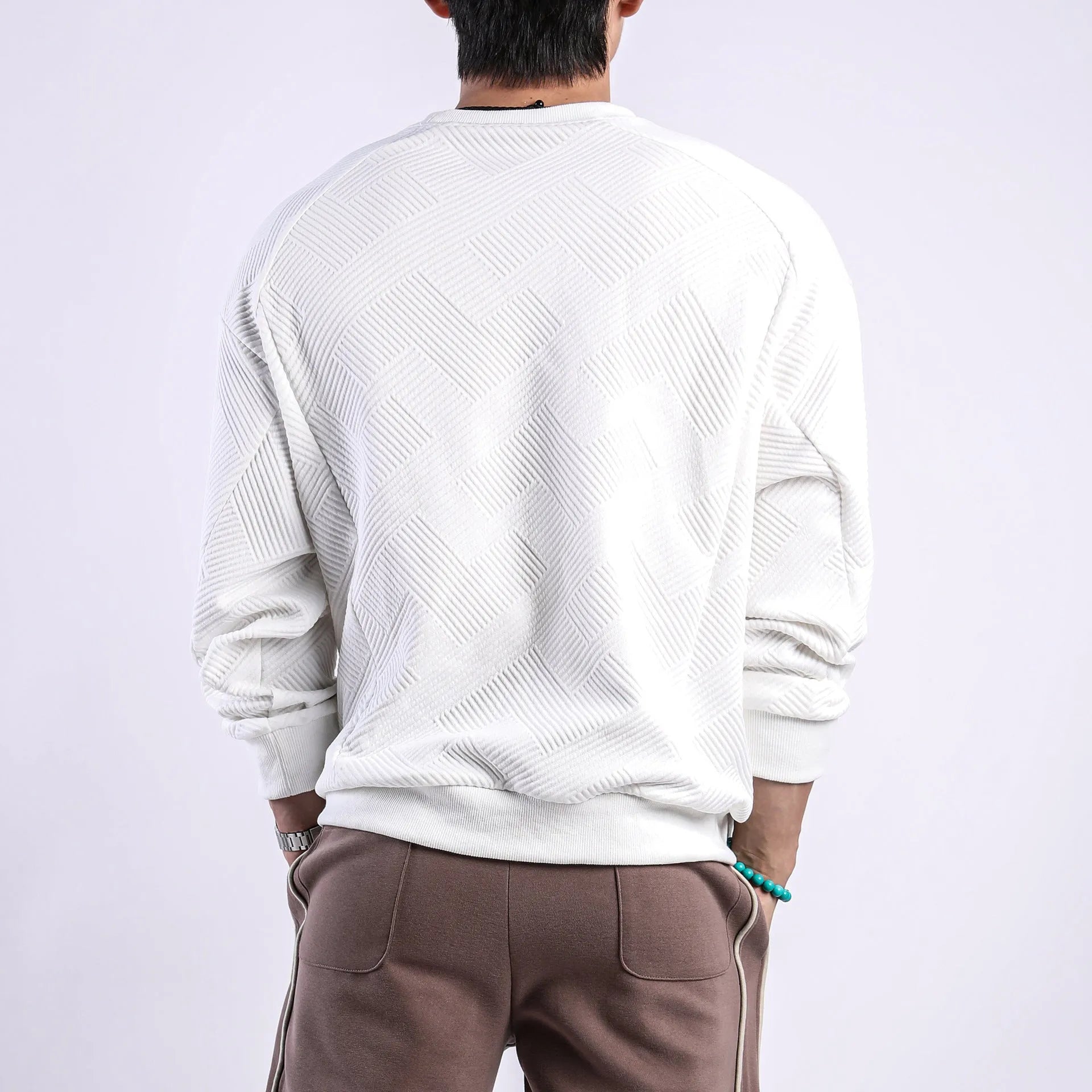 Men's loose fit twill jacquard pullover sweater in solid colours with round neck and long sleeves