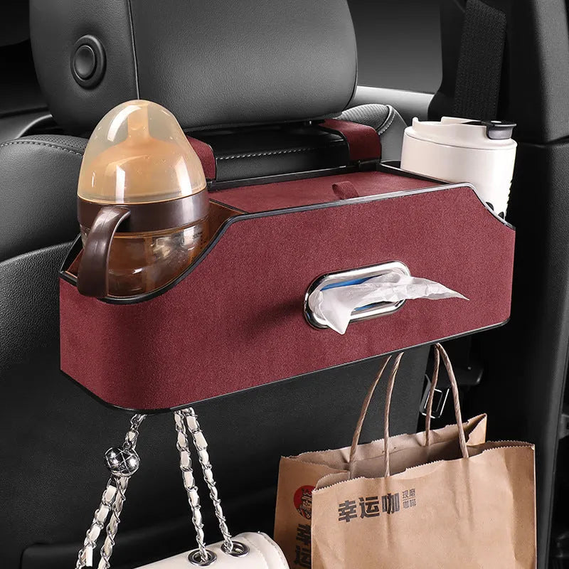 Genuine leather car tissue box and cup holder organiser in black, suspended from a headrest.