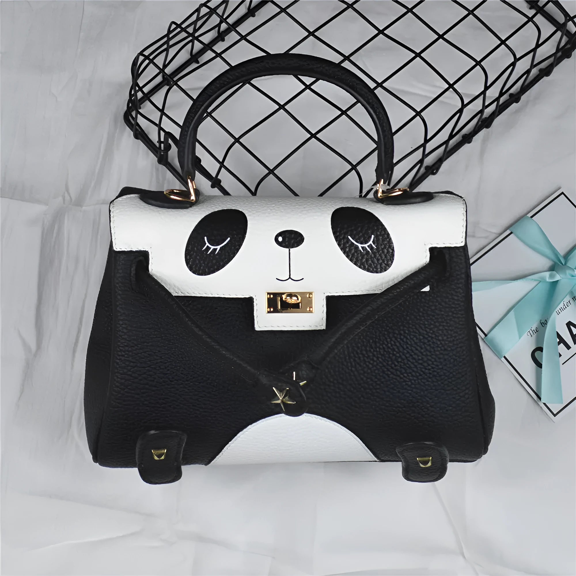 Women's horizontal square cow leather handbag with a sweet lady panda animal print.