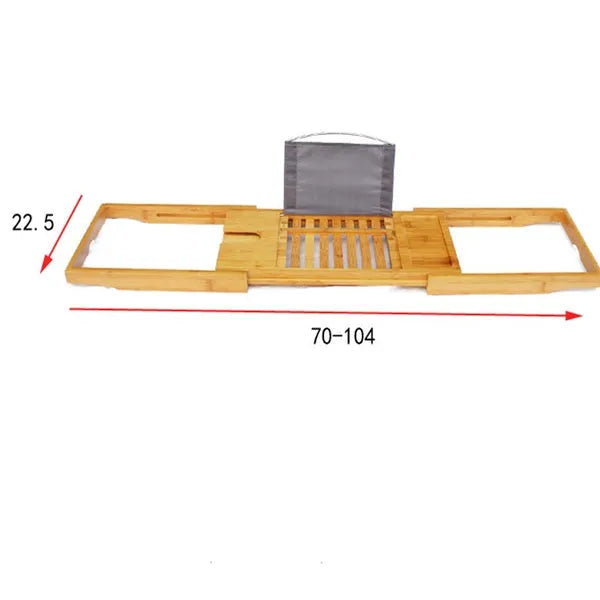 Bamboo bathtub frame storage organiser on bathroom surface holding bathing essentials