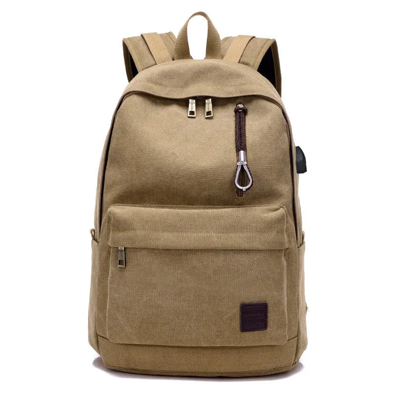Canvas USB rechargeable backpack with laptop compartment showing multiple storage pockets