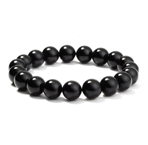 Geometric black agate bead bracelet on elastic cord, showing 8mm bead size.
