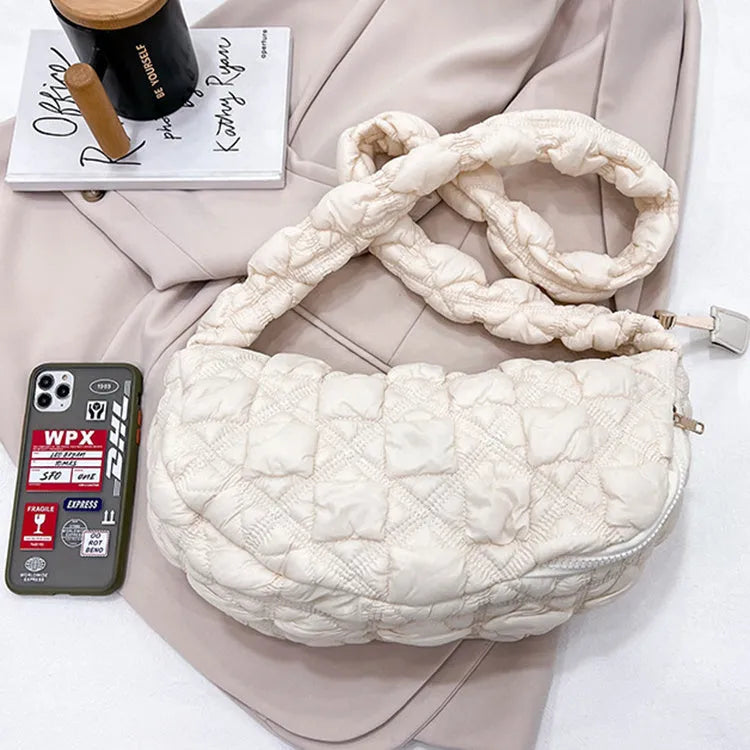 Women's nylon shoulder messenger bag in beige colour showing dimensions and adjustable strap