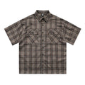 Men's black and brown plaid short sleeve shirt with embroidered lapel detail