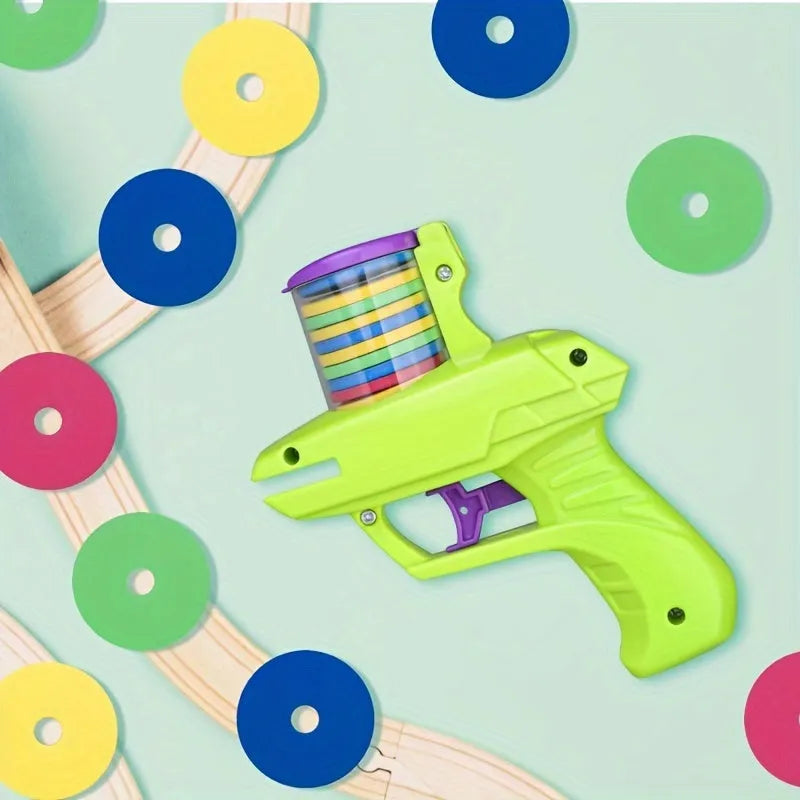 Green interactive cat toy launcher with foam disc for indoor pet play