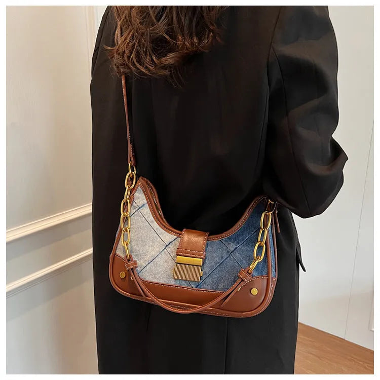 Brown denim women's bucket shoulder bag with diamond mesh pattern and chain detail