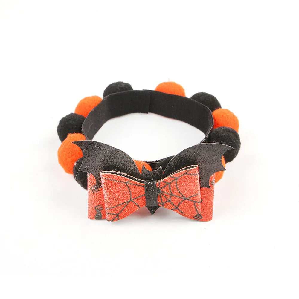 Halloween pet collar with fur ball decorations in pumpkin, skull, witch and bow designs