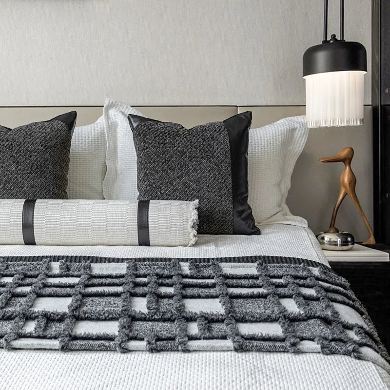 Modern minimalist grey and white plaid bed runner blanket set with pillow on bed