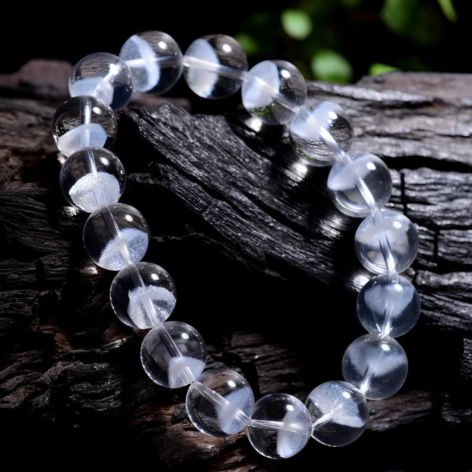 Women's natural white ghost pyramid bracelet with ground crystal beads and Ruyi design element
