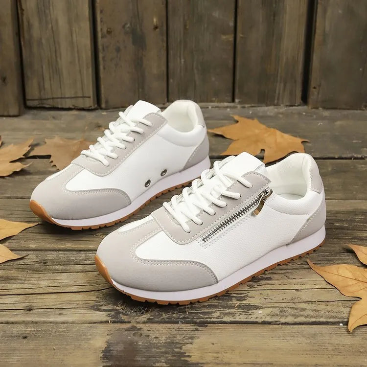Women's flat-heeled shoes in grey, white or Champagne with artificial PU uppers and rubber soles