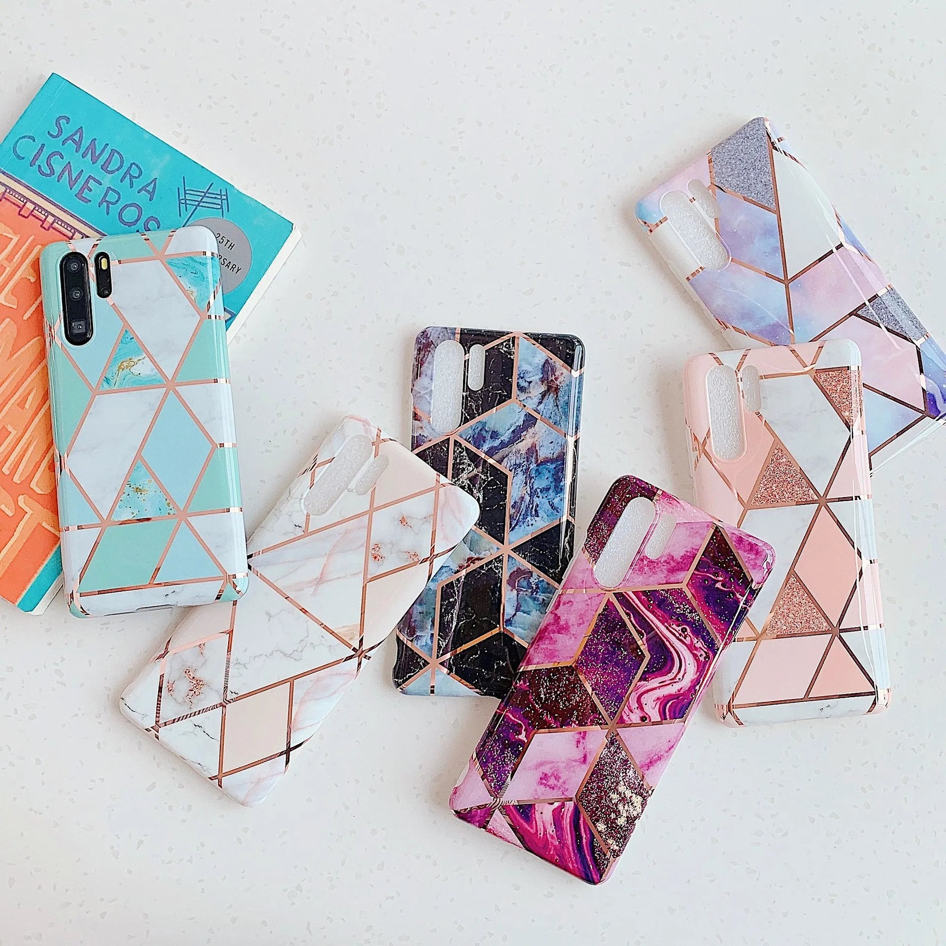 Electroplated marble pattern mobile phone case showing multiple colour options for Huawei and Samsung smartphones