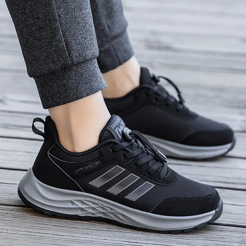 Men's and women's elastic band slip-on casual shoes in mesh material, showing colour options.