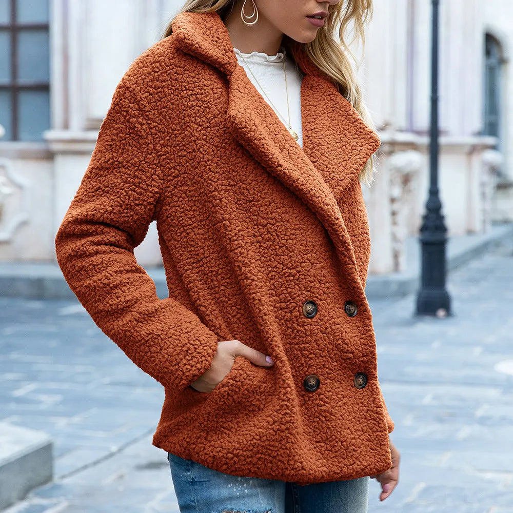 Women's fluffy loose lapel button coat in a range of colours on a size chart background.