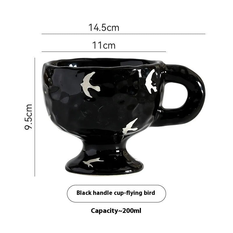 Handmade ceramic mug with irregular shape in solid colour