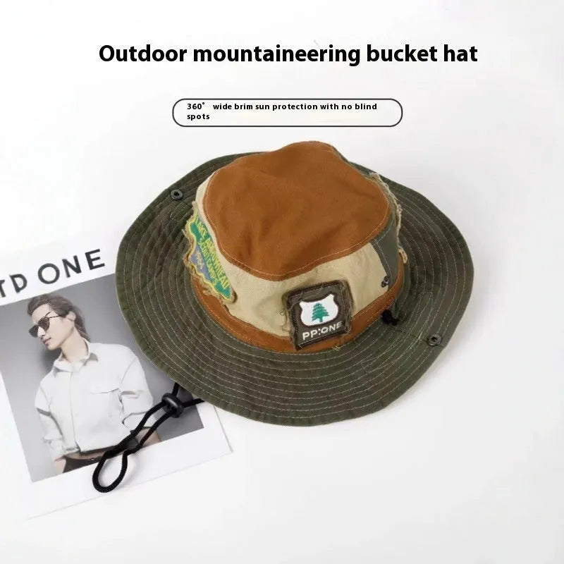 Army green cotton fisherman hat with flat top crown and patchwork hand-painted design