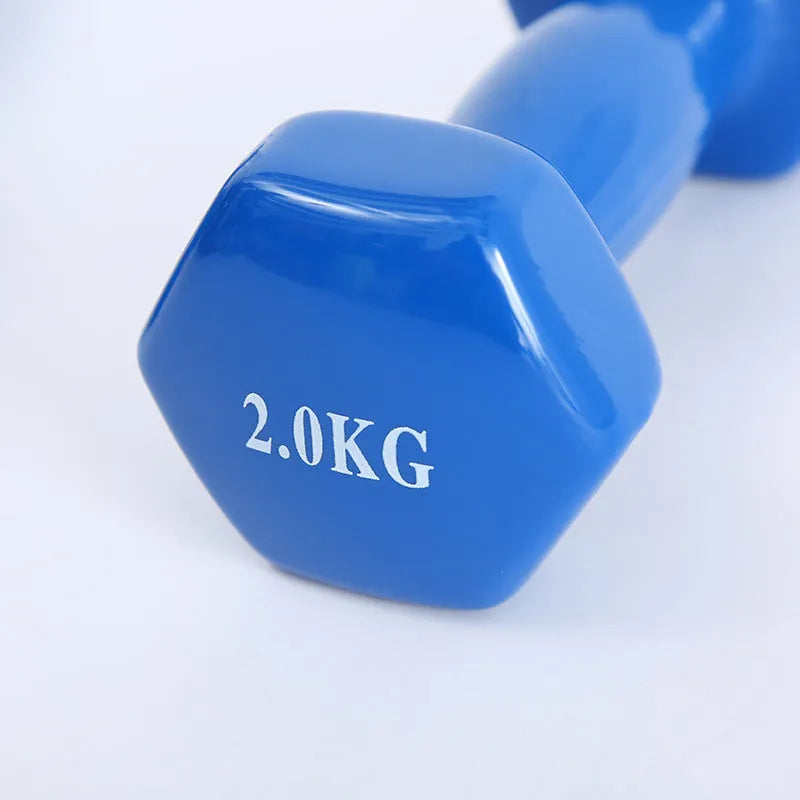 Bright coloured plastic fitness dumbbells with glossy finish in various weights for floor-safe exercise