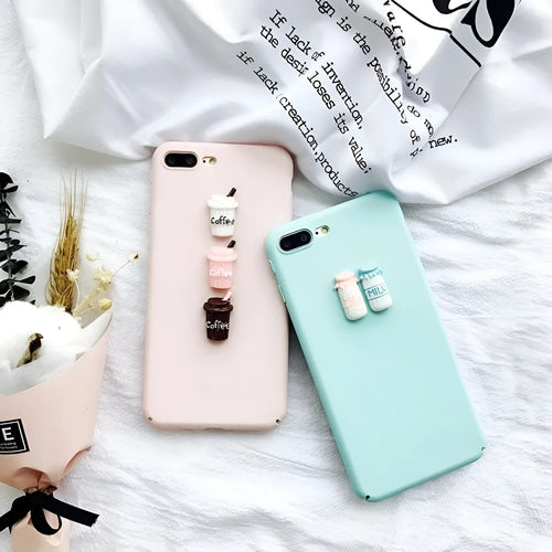 Soft silicone TPU iPhone case with a raised 3D cartoon cat design, shown in various colours.