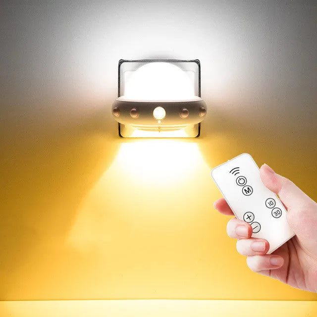 Blue remote control UFO shaped bedside night light with dimensions 105mm by 76mm by 58mm