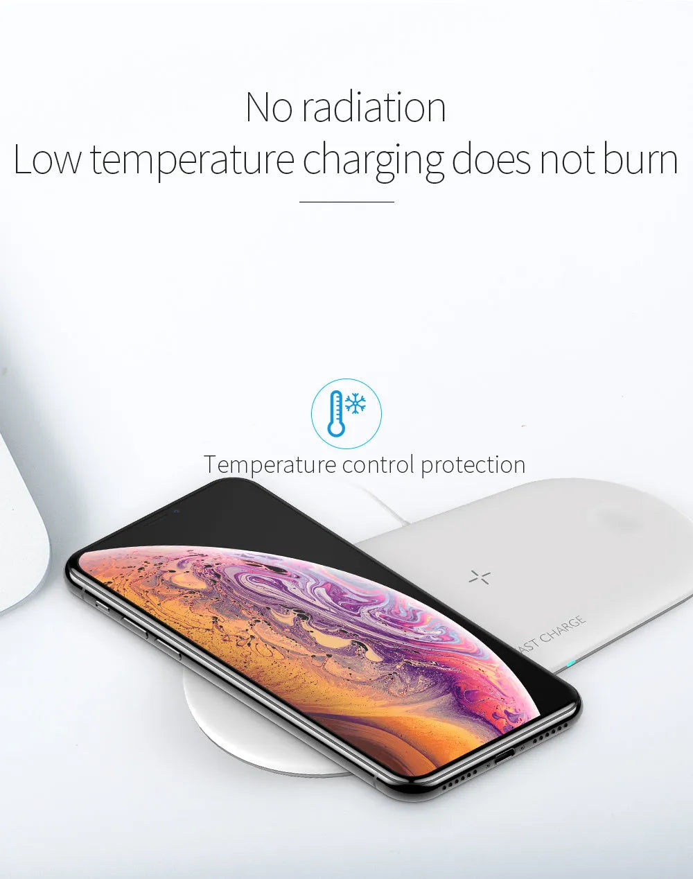 A black or white 3-in-1 wireless charging station for Apple iPhone, watch, and headphones on a desk.