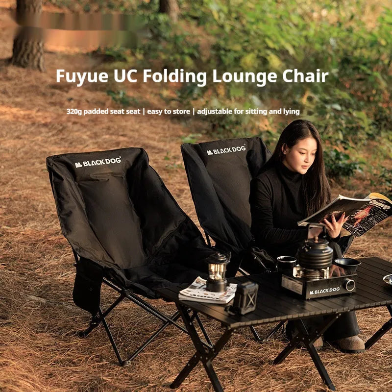 Night Black portable folding moon chair for outdoor camping and beach use.
