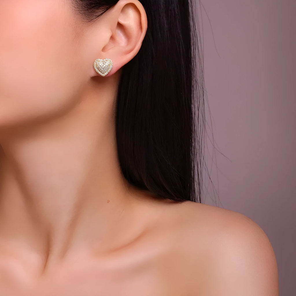 Golden heart-shaped moissanite stud earrings on S925 sterling silver posts