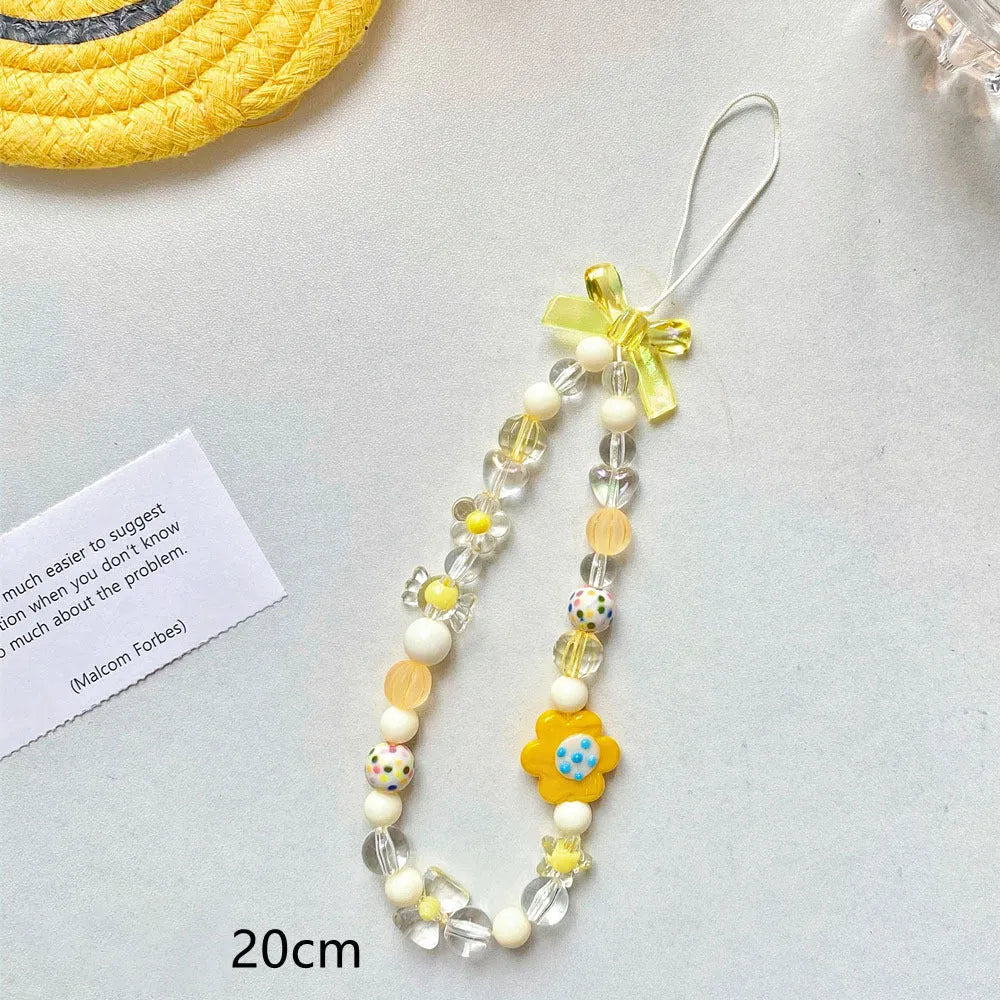 Colourful beaded flower mobile phone lanyard with hand rope and decorative floral elements