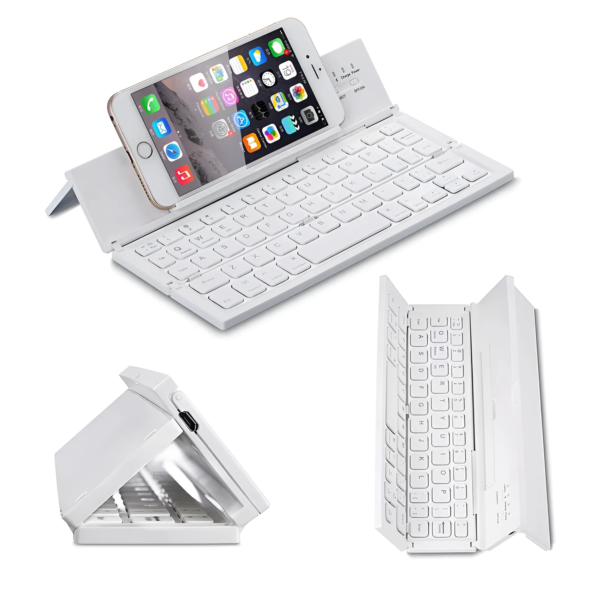 A black mini folding wireless Bluetooth keyboard shown open next to a tablet.