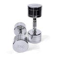 Silver pure steel electroplated dumbbell with ergonomic handle on a grey background.