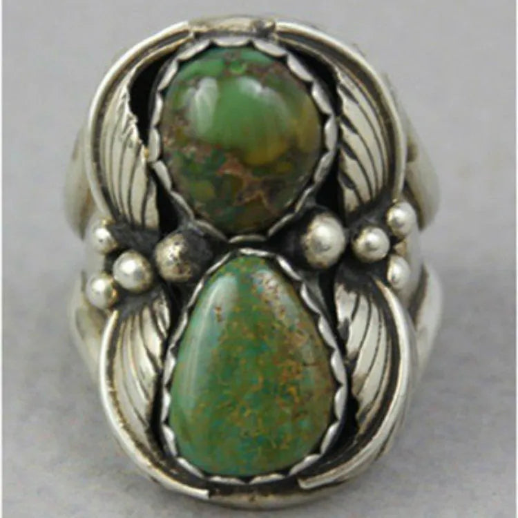 Turquoise geometric alloy ring with retro inlaid design on a woman's hand