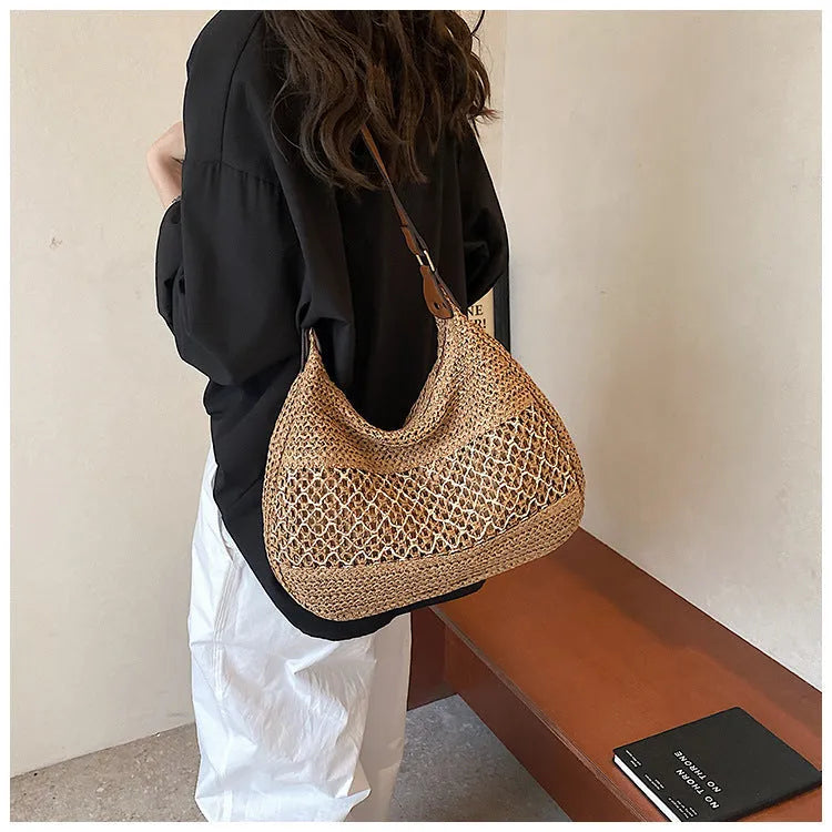Women's khaki and milky white soft straw cross body bag with a horizontal square shape and sandwich pocket.