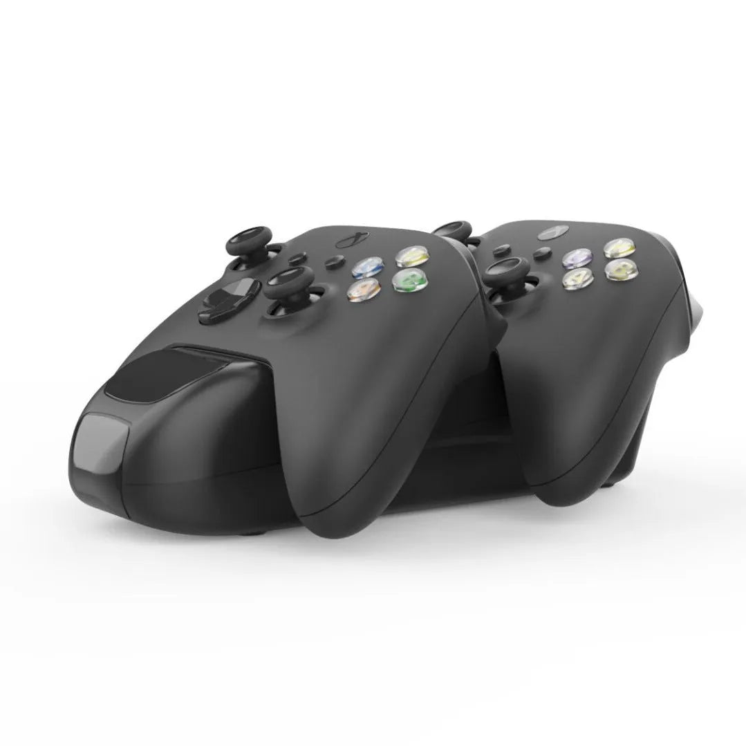 Black Xbox Series X wireless controller charging station showing two controllers docked with LED indicators visible