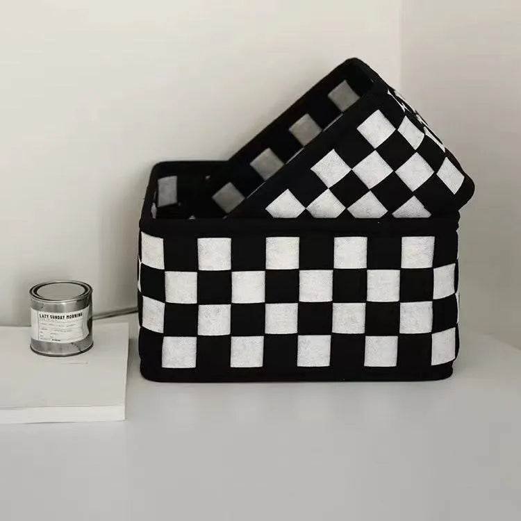 Checkerboard patterned grey felt folding storage basket showing collapsible sides, dimensions 37cm by 29cm by 19.5cm.