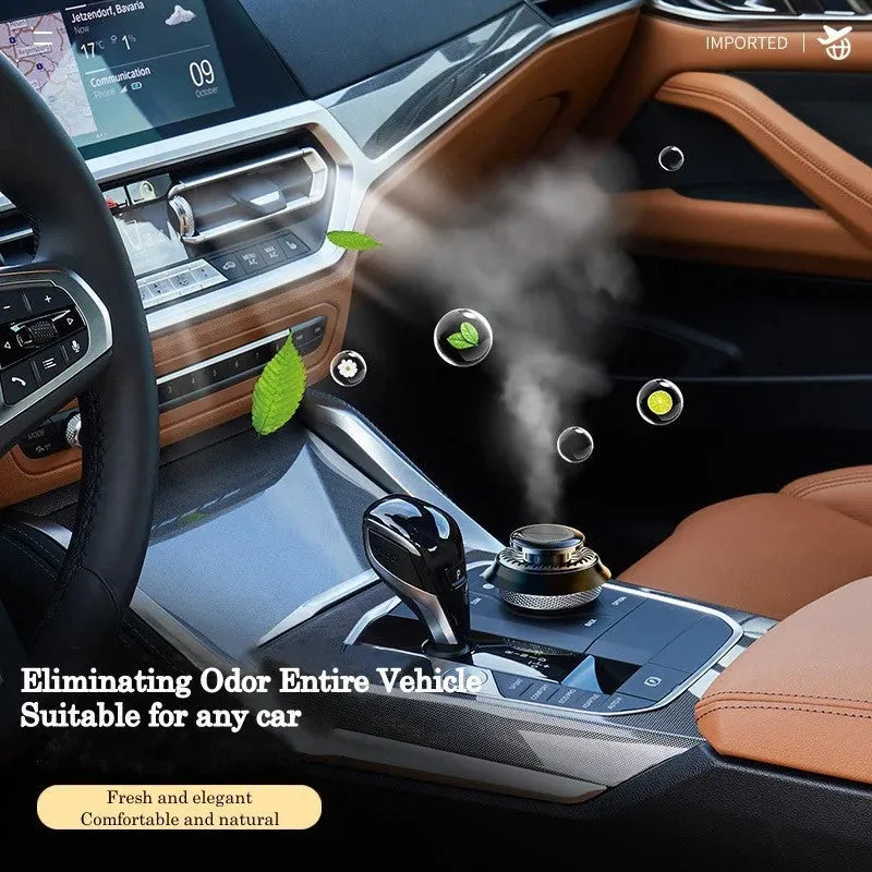 Solar-powered kinetic car air freshener with rotating double rings on a car dashboard.
