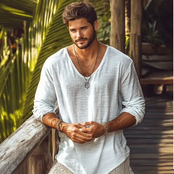 Beige slim fit long sleeve v-neck t-shirt laid flat, showing solid colour and fabric texture.