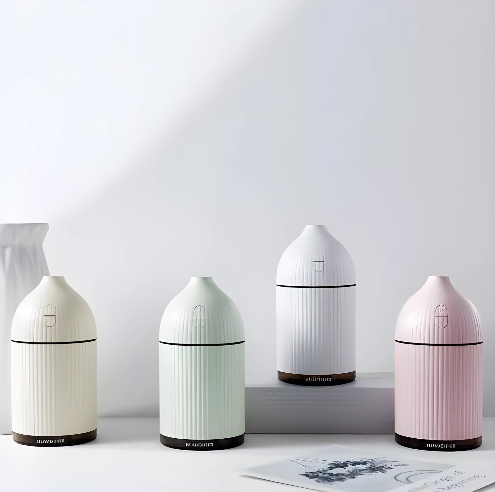White ultrasonic aromatherapy diffuser humidifier with LED light, 300ml capacity, 80mm cube design