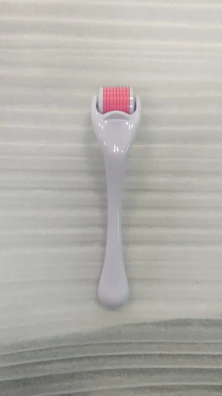 540 micro needle derma roller showing handle and wheel in different colour combinations with size specifications